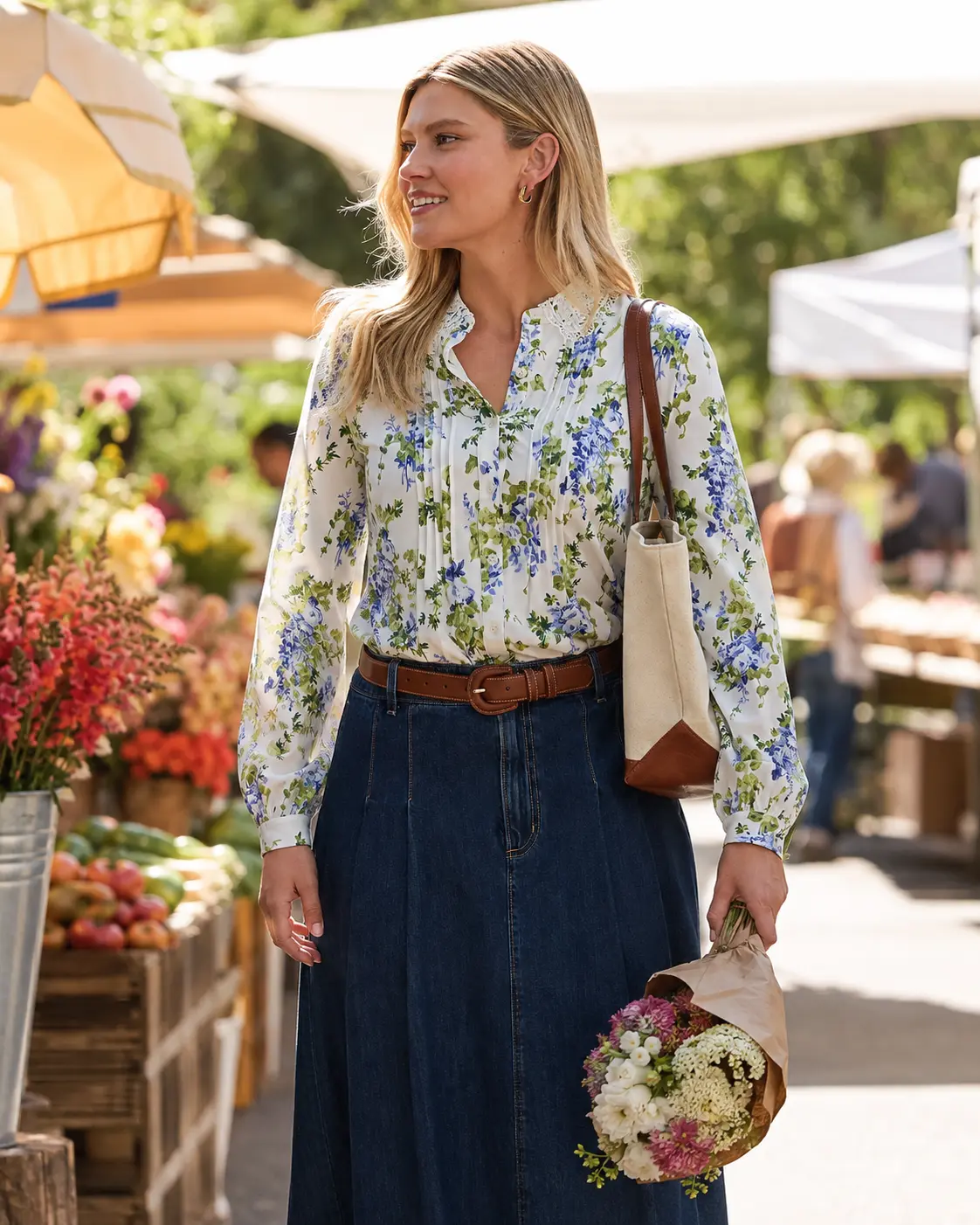 Model in a floral pintuck blouse at a farmers market